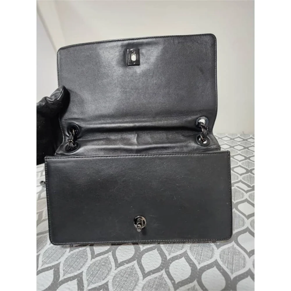 Authentic CHANEL Quilted Lambskin Leather Orient Express Flap Bag Black
